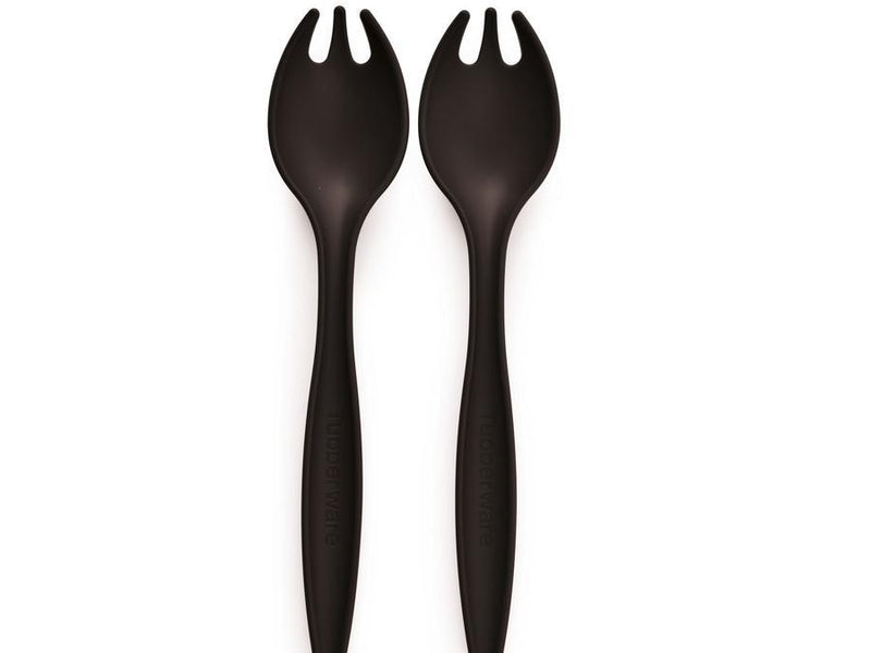 two vertical tupperware serving forks