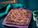 baked brownies in a tupperware silicone rectangular form