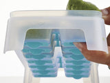 woman holding a tupperware fresh and pure ice tray