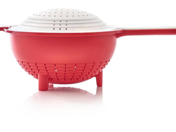 Tupperware red and white double colander with a red base and a flipped over white strainer on top